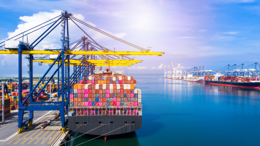 Container ship being loaded at port